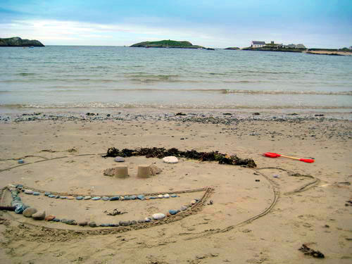 Happy face at Rhoscolyn Beach